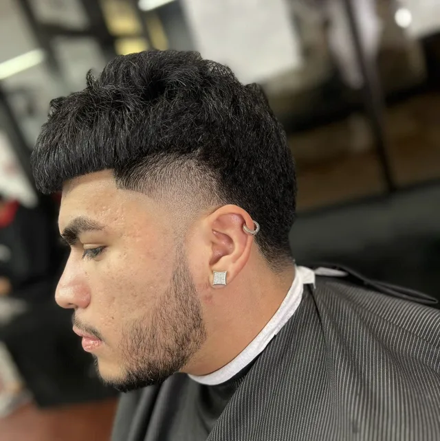 Dark side-part haircut, cut at BR Barber Lounge